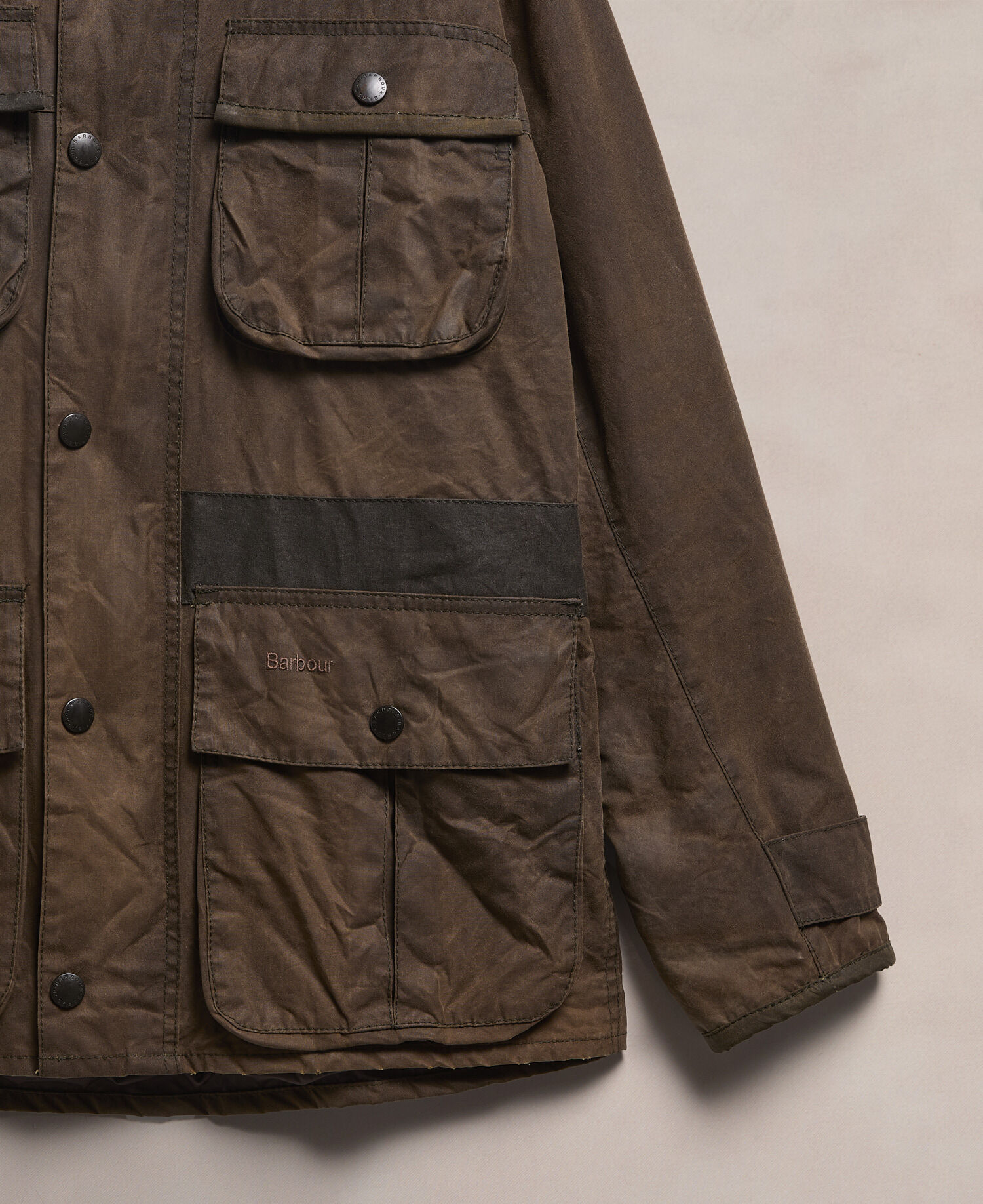 Shop the Barbour Re-Loved Men's Trooper Waxed Jacket in Olive today.