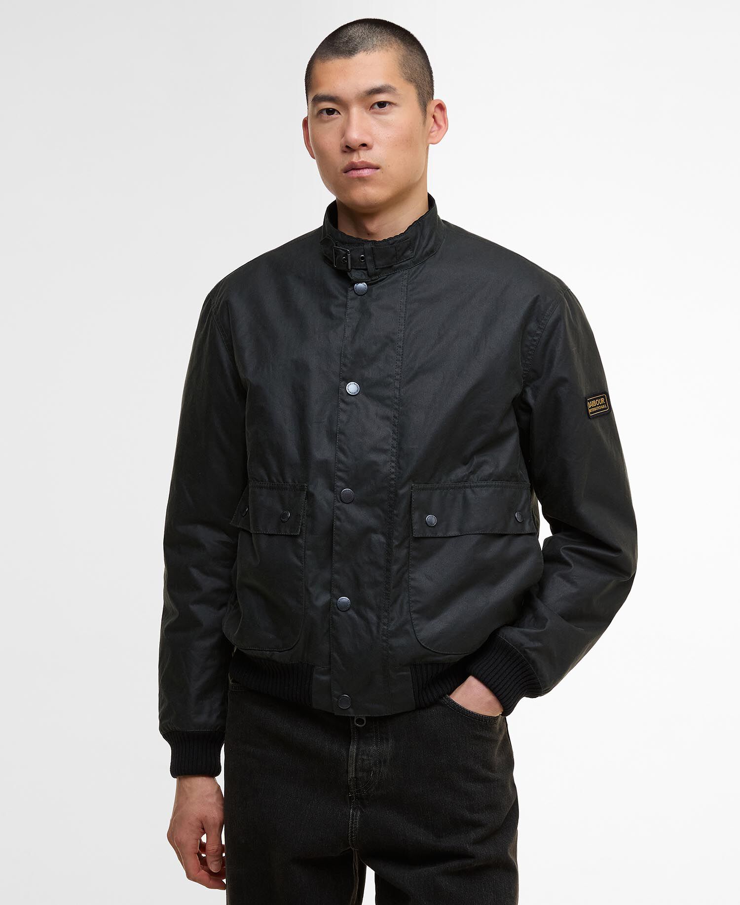 Buy Traction Waxed Jacket for GBP 319.00 | BARBOUR_GB