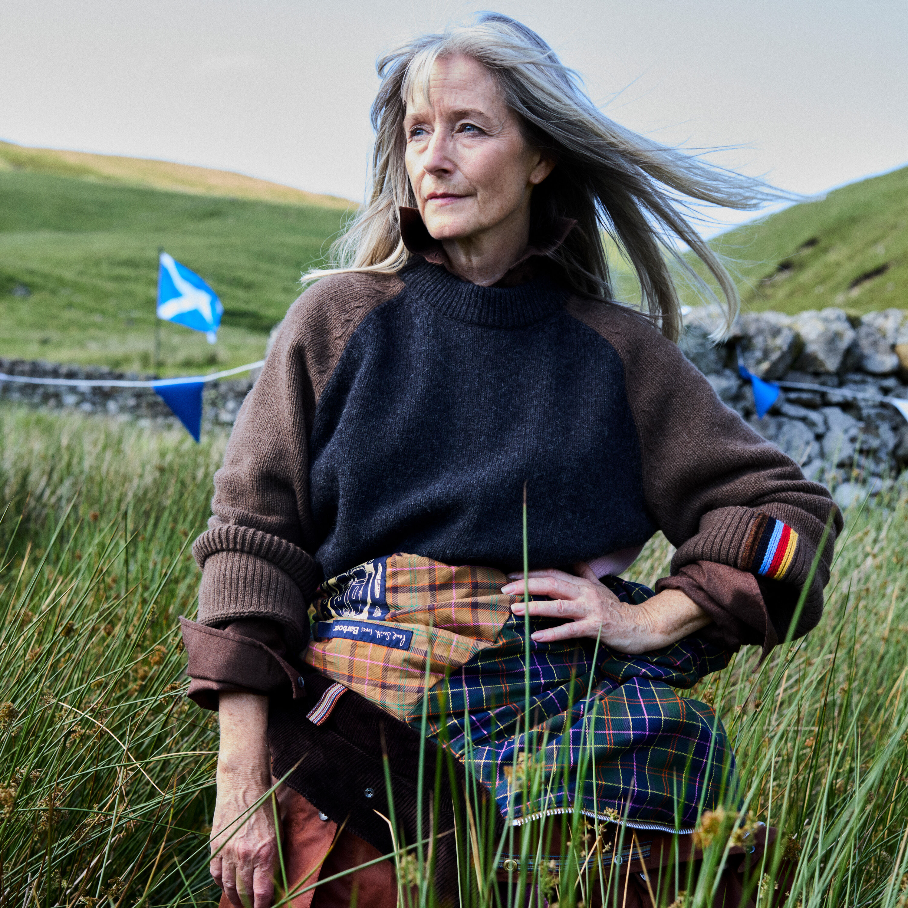 Lady wearing the Barbour x Paul Smith Tyneside Knitted Jumper in Black Multi