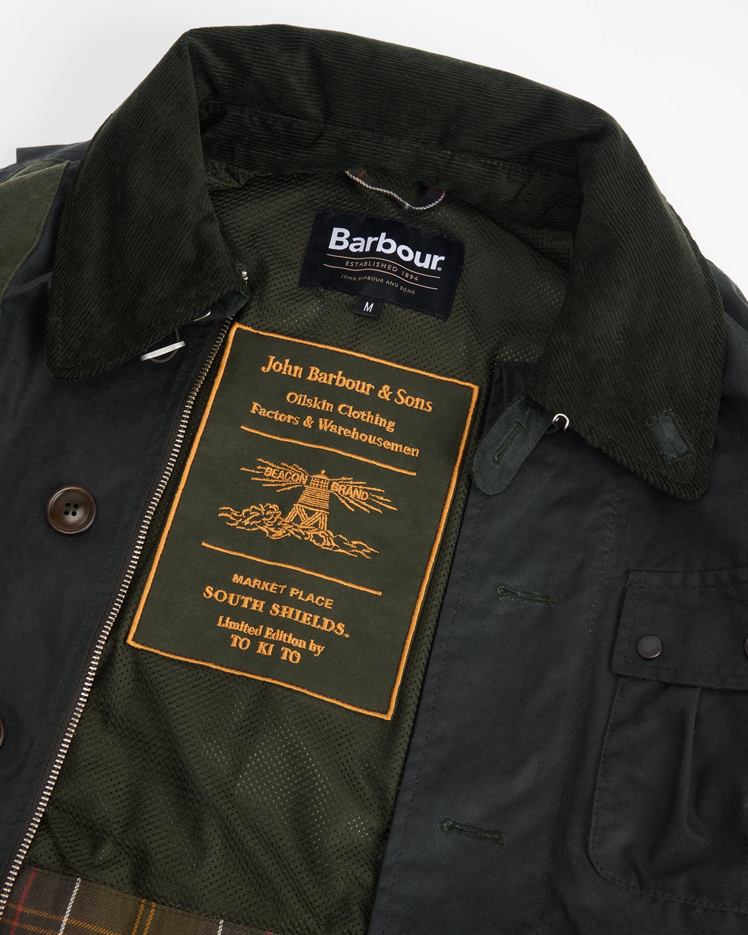 Shop the Barbour x TO KI TO Forest Waxed Jacket in Green
