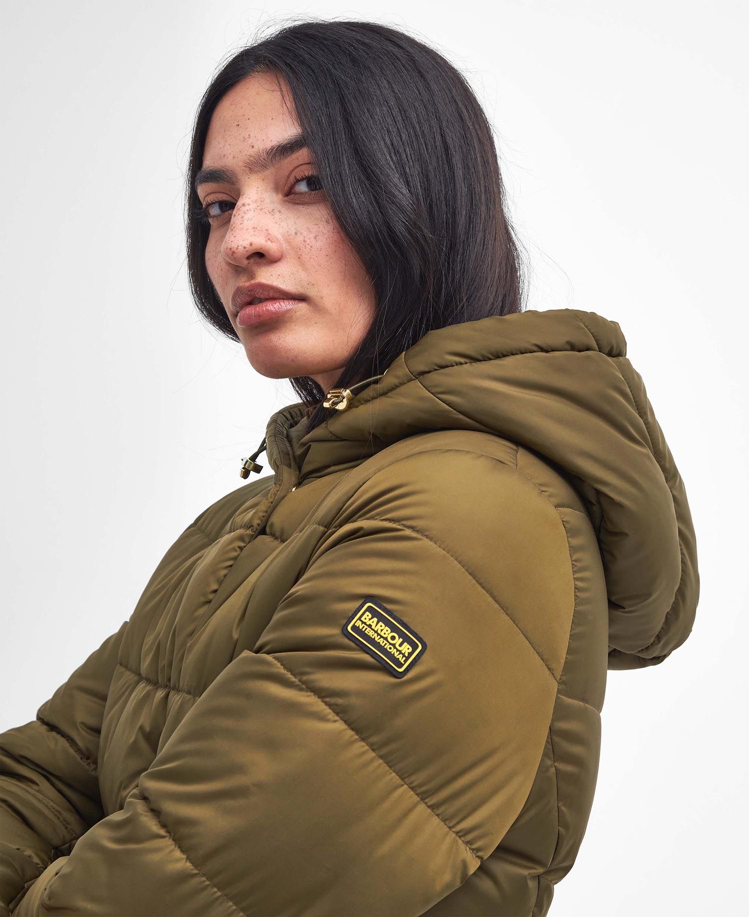 Shop the B.Intl Track Line Quilted Jacket in Green today