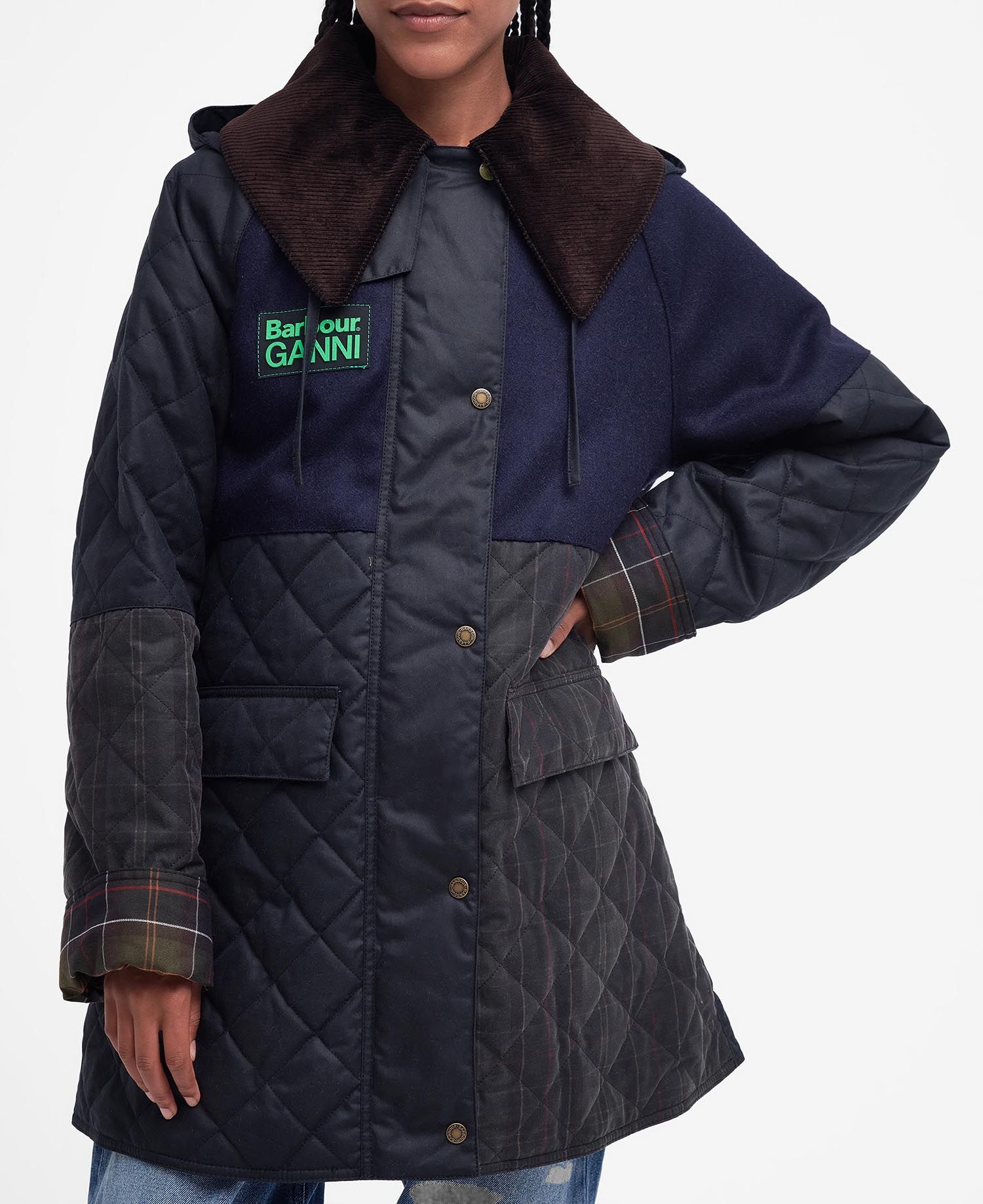 Shop the Barbour x Ganni Short Burghley Quilted Wax Jacket in Navy today.