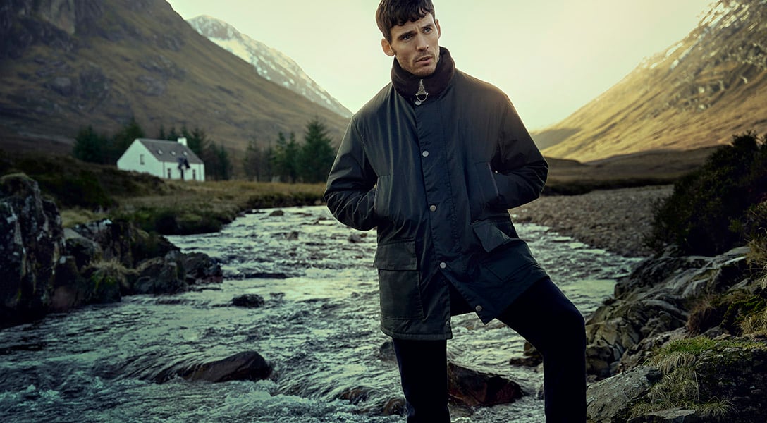 Sam Claflin wears Barbour Gold Standard Border Wax AW20 at Glencoe