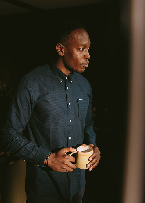 Bola Odusina wears the Barbour AW21 Mens Tartan Collection