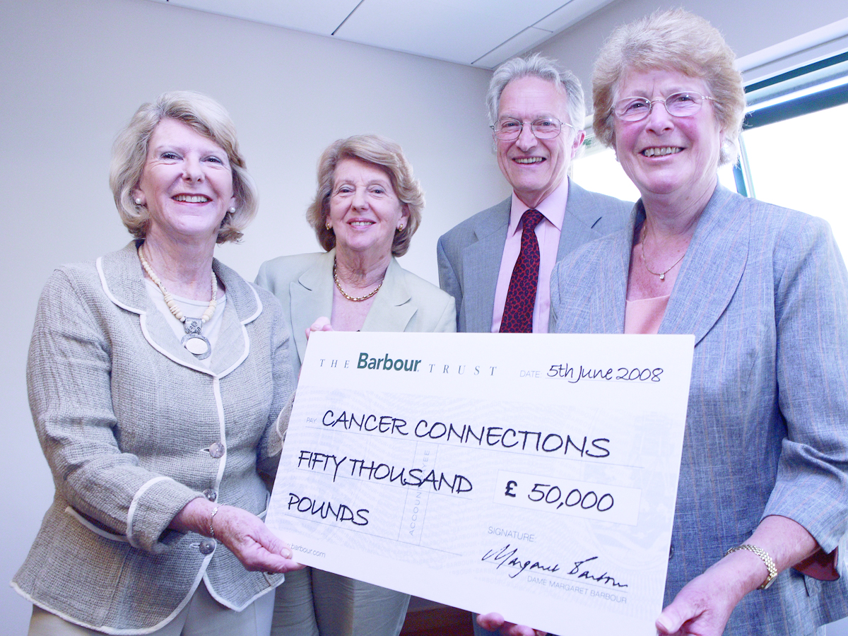 Dame Margaret Barbour presents a cheque to Cancer Connections, a South Tyneside charity in the North East of England dedicated to serving individuals and families, suffering from cancer.