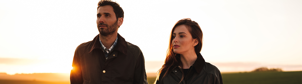 Man and Woman in Barbour waxed jackets