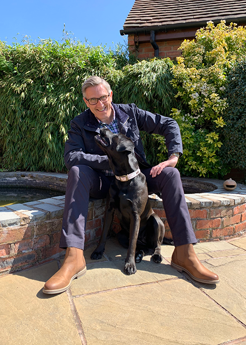 Dogfather Graeme Hall with his dog Lily