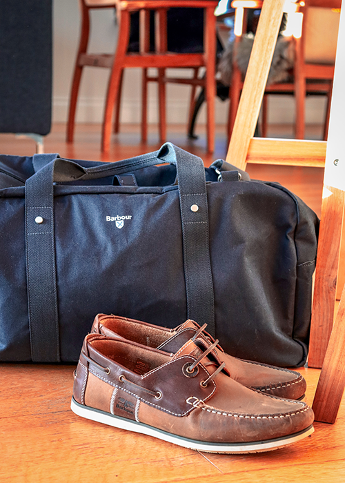 Barbour Cascade holdall with the Barbour Capstan boat shoes